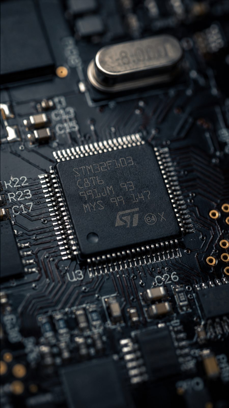 Close-up of an STM32 microcontroller on an embedded circuit board